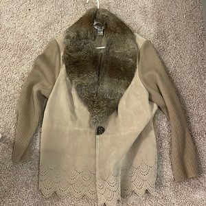 leather jacket with an animal fur collar
